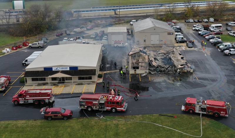 Smoke can be seen smouldering from Conroy's Automotive and 24 Hour Towing building on Wednesday, Nov. 6, 2024 in Ottawa. Fire departments from Wallace, Grand Ridge, Senera, Seneca, Utica and Peru all responded to the blaze.