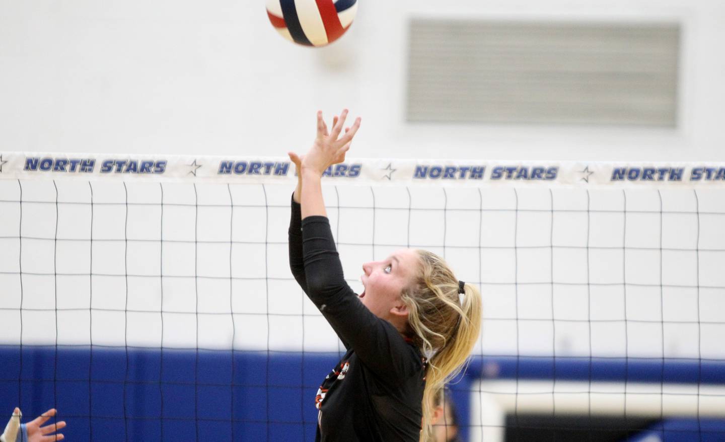 Wheaton Warrenville South’s Rebecca Bellows sets the ball during a game at St. Charles North on Tuesday, Sept. 6, 2022.