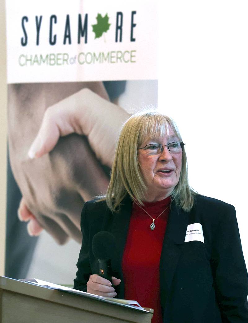 Kim Kramer, from Kramer's Kitchen and Bath, speaks after her business was named the winner of the Chamber Champion award during the Sycamore Chamber of Commerce Annual Meeting Thursday, March 6, 2025, at St. Mary's Catholic Church in Sycamore.
