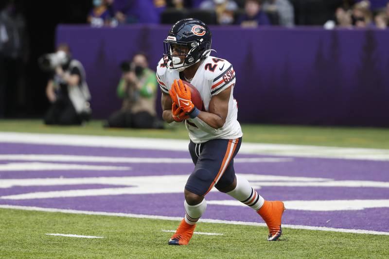 Chicago Bears running back Khalil Herbert returns a kickoff during the first half against the Minnesota Vikings, Sunday, Jan. 9, 2022, in Minneapolis.