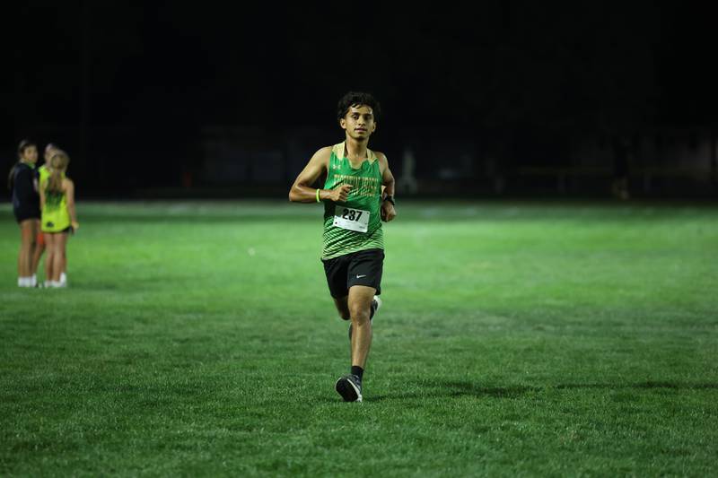 Bishop McNamara's Diego Perez runs during the All-City cross country meet at Bishop McNamara on Wednesday, Sept. 17, 2025.