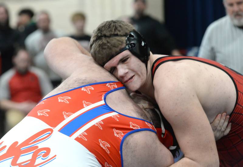 Erie-Prophetstown's Ceaeb Reymer leans into Oregon's Briggs Sellers during the 285-pound title bout at the Polo Wrestling Invitational on Saturday, Jan. 11, 2025 at Polo High School. Reymer won the match.