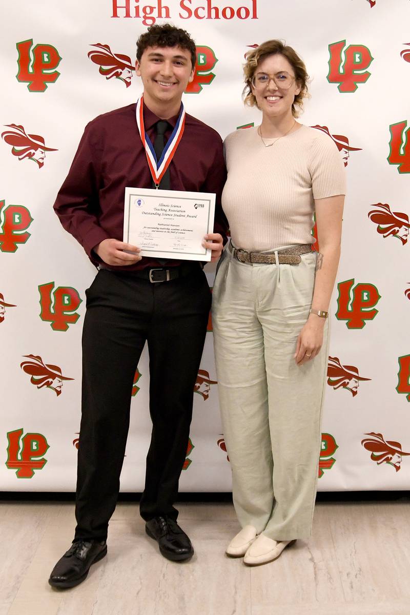 Nathaniel Hansen (left) is the recipient of the 2024 Illinois Science Teachers Chemistry Award at La Salle-Peru High School.