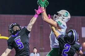 Photos: York football travels to Downers Grove North to take on Trojans 