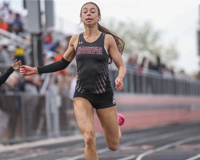 Plainfield North's Lauren Dellangelo wins in the 100m during Southwest Prairie Conference Girls Track and Field Meet Wednesday, May 7, 2025 in Minooka.
