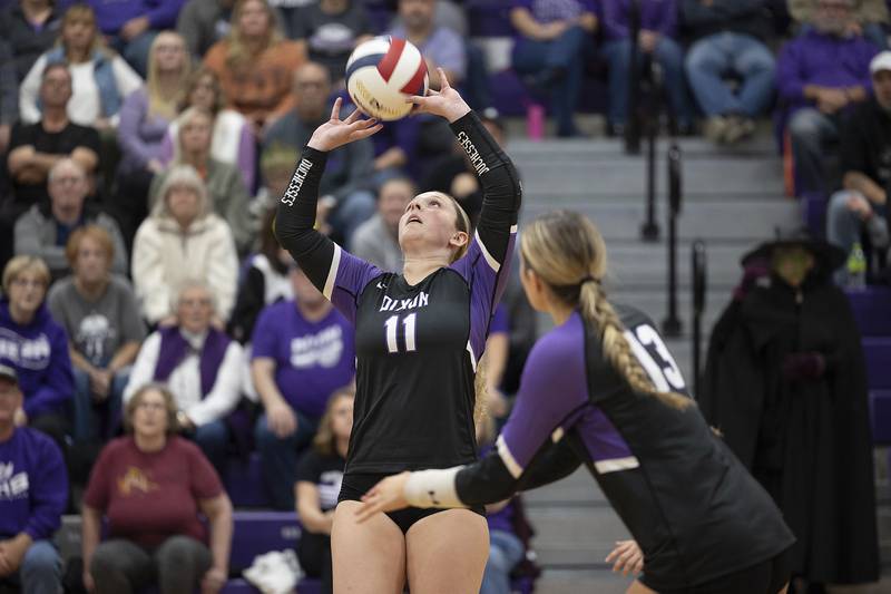 Dixon’s Presley Lappin sets the ball against Morris Thursday, Oct. 31, 2024 in the class 3A regional championship at Dixon High School.
