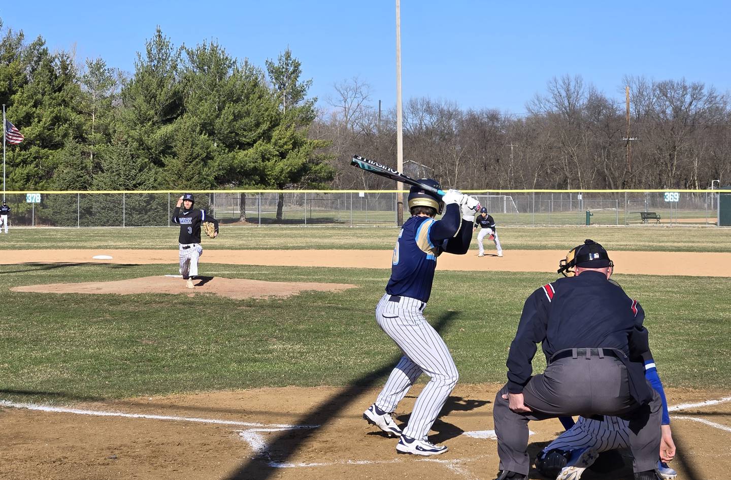 Newark's Kiptyn Bleuer readies to throw a pitch to Marquette's Alec Novotney in the first inning of Monday's game at Masinelli Field in Ottawa.