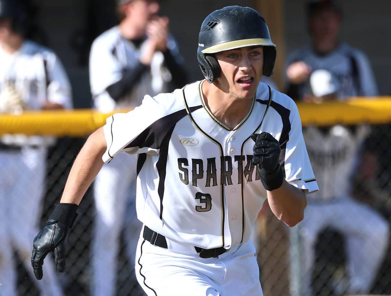Sycamore's Benjamin Anderson hustles to first base Tuesday, April 28, 2026, during their game against Kaneland at the Sycamore Community Sports Complex.
