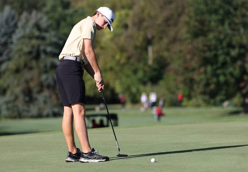 Morris’ Braden Wickkiser putts on the third hole Monday, Sept. 23, 2024, during the Interstate 8 boys golf tournament at the Kishwaukee Country Club in DeKalb.