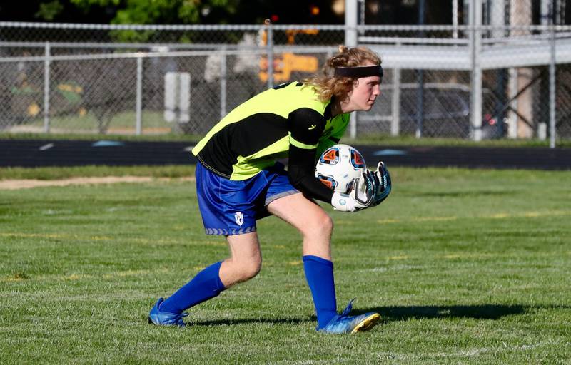 Princeton keeper Niklas Schneider makes a play at the net Monday against Streator.