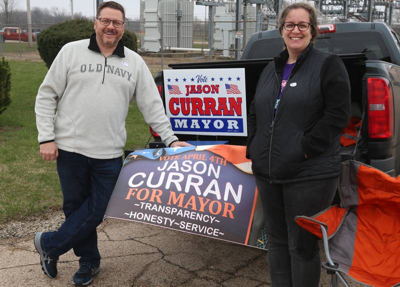 Oglesby mayoral candidate Jason Curran and his wife Kmberly smile for a photo while campaigning along Illinois Route 351 near the Oglesby Fire Station on Tuesday, April 4, 2023 in Oglesby.