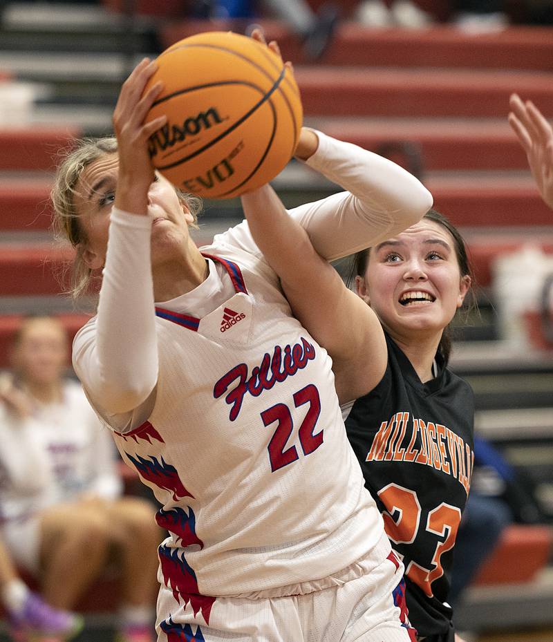 Morrison’s Avery White is defended by Milledgeville’s Brinley Hackbarth Wednesday, Jan. 22, 2025.