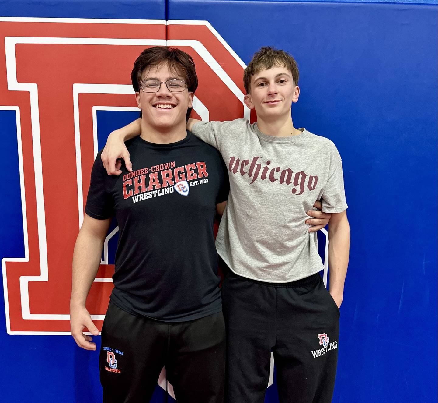 Dundee-Crown's Teigen Moreno and Aiden Healey (left to right) each earned wins for the Chargers during Friday's FVC dual against Huntley.