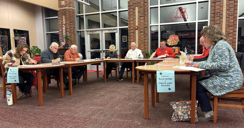 Members of the Streator High School Board discuss the district’s proposed tax levy during their Monday night meeting.