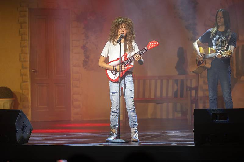 Malachi Dagner (left) and Silas Graff perform “Paradise City” Sunday, June 2, 2024 at The Dixon theater during an updated version of “The Taming of the Shrew.”