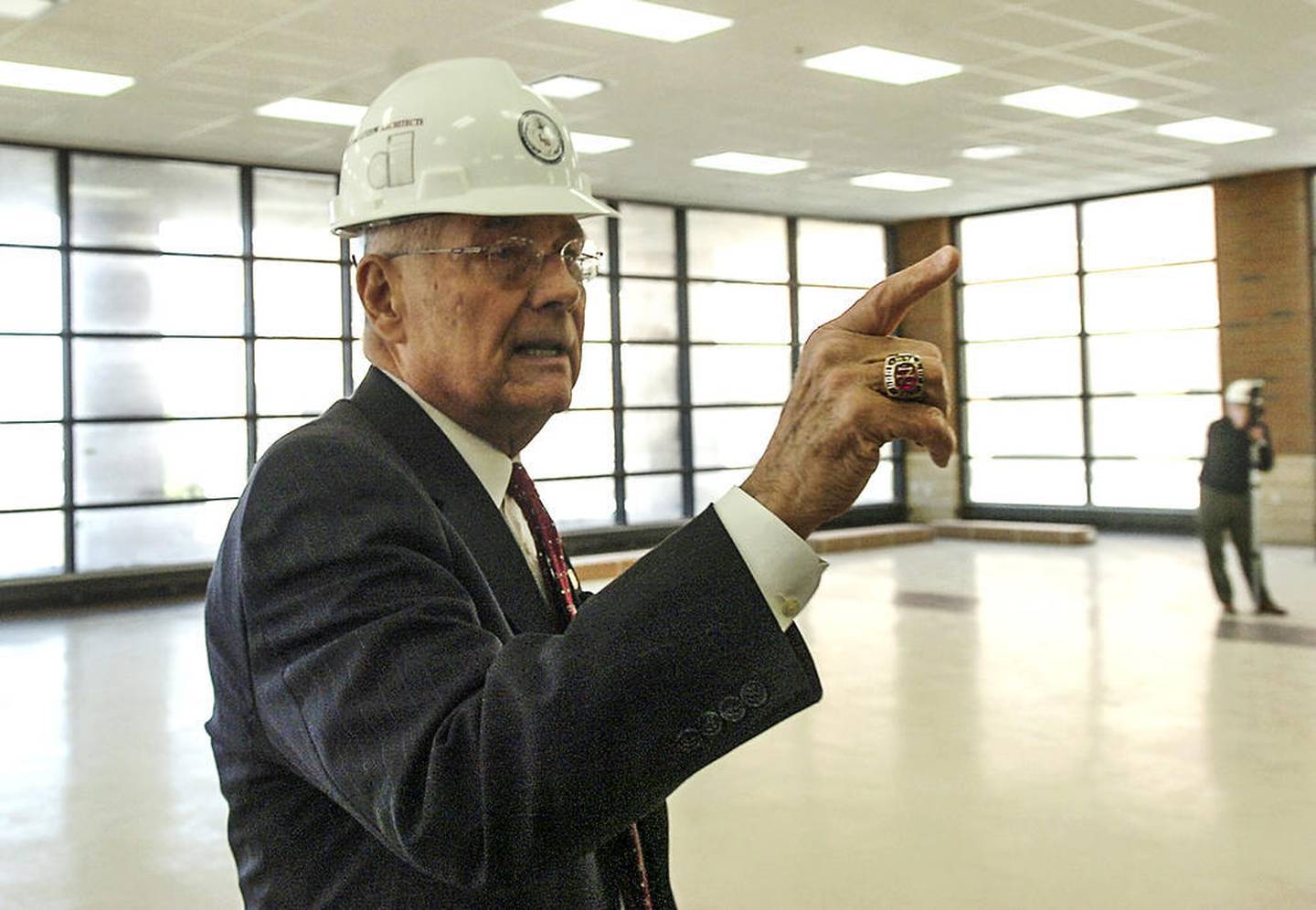Former Lincoln-Way High School District 210 Superintendent Lawrence Wyllie leads a tour through the Lincoln-Way North High School facility April 12, 2008, in Frankfort.