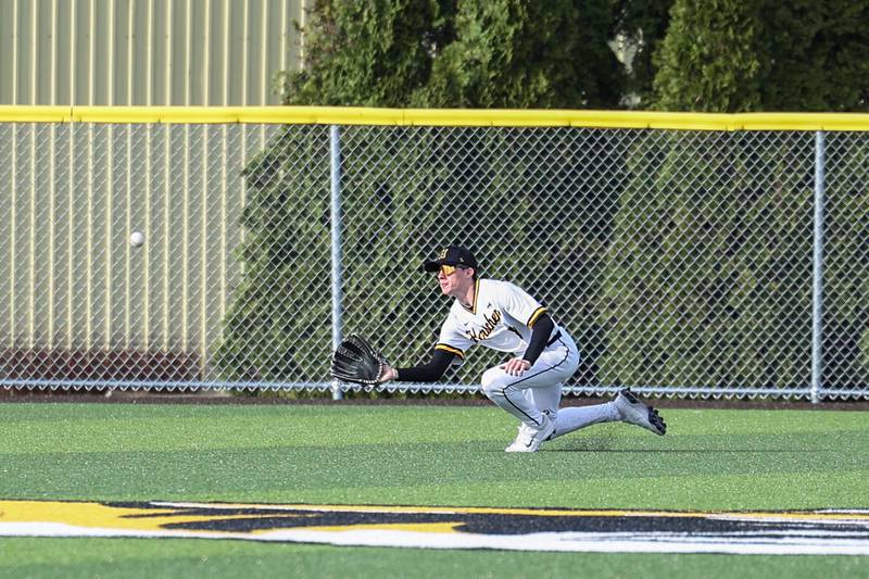 Herscher's Payten Young makes a diving catch in the outfield during the Tigers' 3-0 loss to Wilmington on Monday, April 14, 2025.