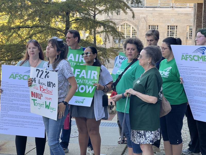 Northern Illinois University workers Sara Finnigan, Rave Meyer, Rick Surber, Ginna Garcia, Felicia Owens Virginia Naples, Jason Derrington, Lorri Marshall and others march through campus on Sept, 16, 2025, to push for higher wages.