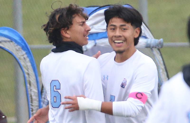 Kankakee's Alexis Cruz hugs teammate Yael Calderon after scoring a goal during the Class 2A Regional title game on Saturday, Oct. 25, 2025 at Ottawa High School.