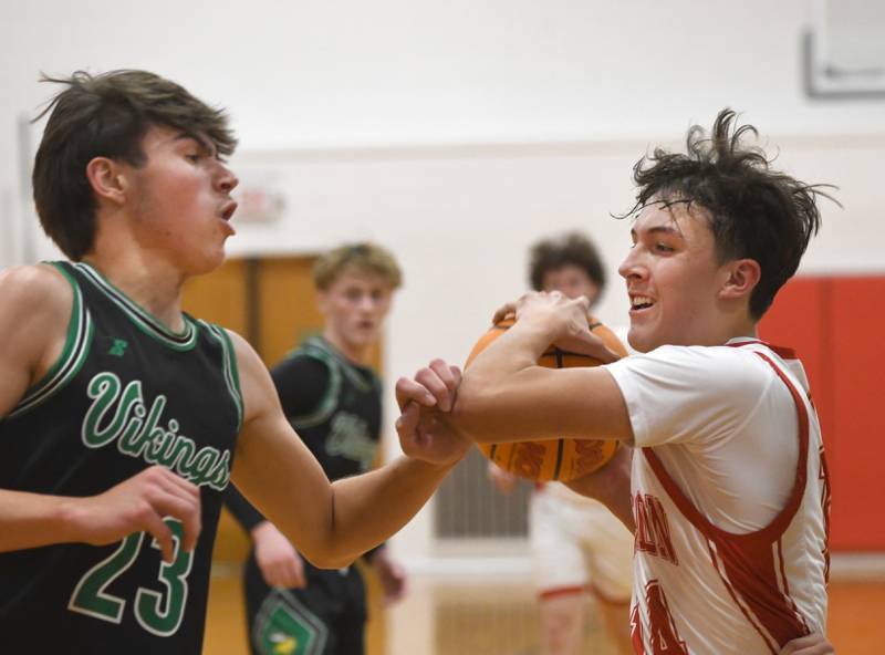 Morrison's Izaak Neas drives the lane against North Boone at the Oregon Boys Basketball Thanksgiving Tournament on Wednesday, Nov. 26, 2025 at Oregon High School.