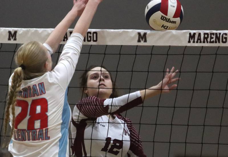 Marengo’s Addison Sanchez dispatches the ball past Marian Central’s  Nola Midday in IHSA Class 2A Regional volleyball action on Monday, Oct. 28, 2024, at  Marengo High School  in Marengo.
