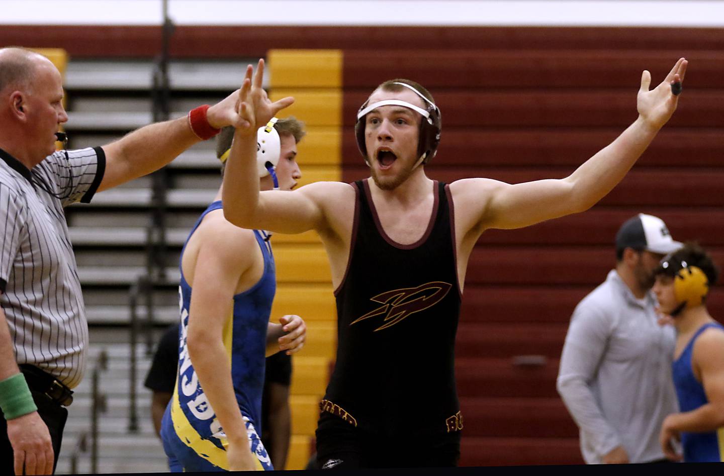 Richmond-Burton's Issac Jones celebrates his win over Johnsburg's Carson Teschner in the 157-pound match of a Kishwaukee River Conference wrestling match on Thursday, Jan. 25, 2024, at Richmond-Burton High School.
