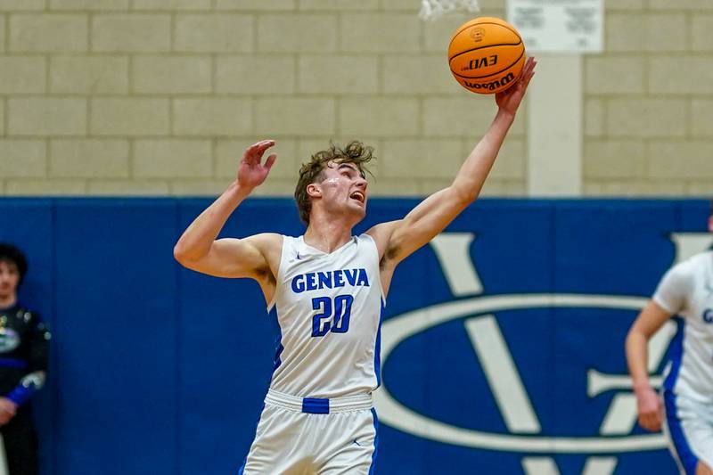 Geneva’s Jack Hatton (20) steals a pass against Glenbard North during a class 4A Geneva Regional final basketball game at Geneva High School on Friday, Feb. 28, 2025.