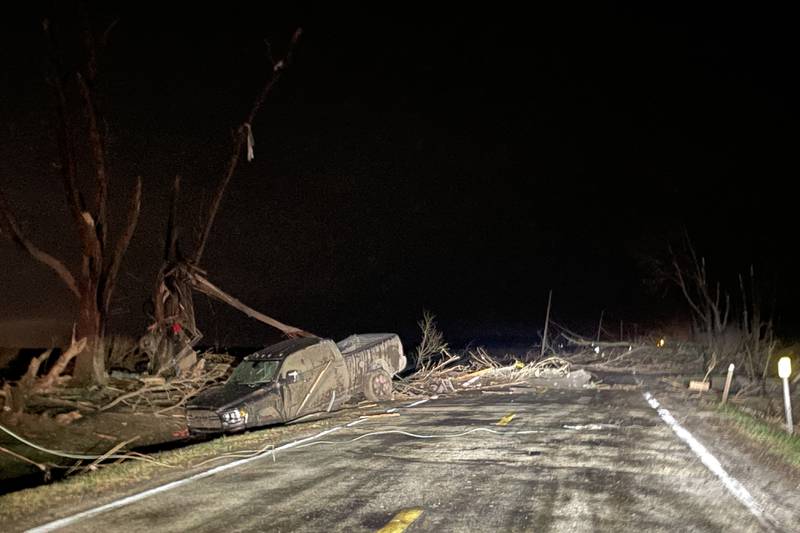 Damage is seen along South Sandbar Road in Aroma Park after severe thunderstorms and a tornado passed through the area on March 10, 2026.