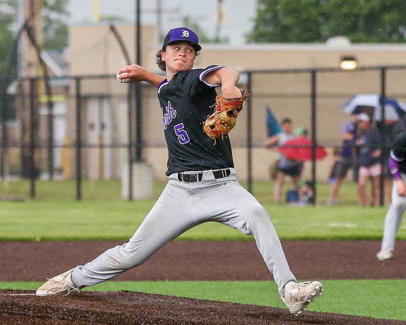 Downers Grove North's Ryan Dennison (5) delivers a pitch during Class 4A Romeoville Sectional semifinal between Oswego East at Downers Grove North.  May 31, 2023.