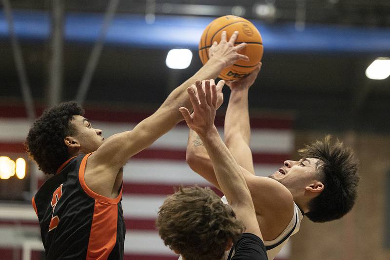 Sterling’s Nico Battaglia is fouled by UT’s Jordan Massey Tuesday, Jan. 14, 2025.