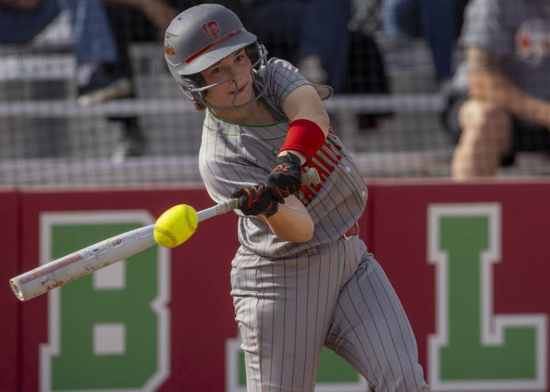 Makenzie Chamberlain connects with a pitch from Kaneland Highschool during the game on April 28, 2025 at the LaSalle Peru High School Sports Complex.