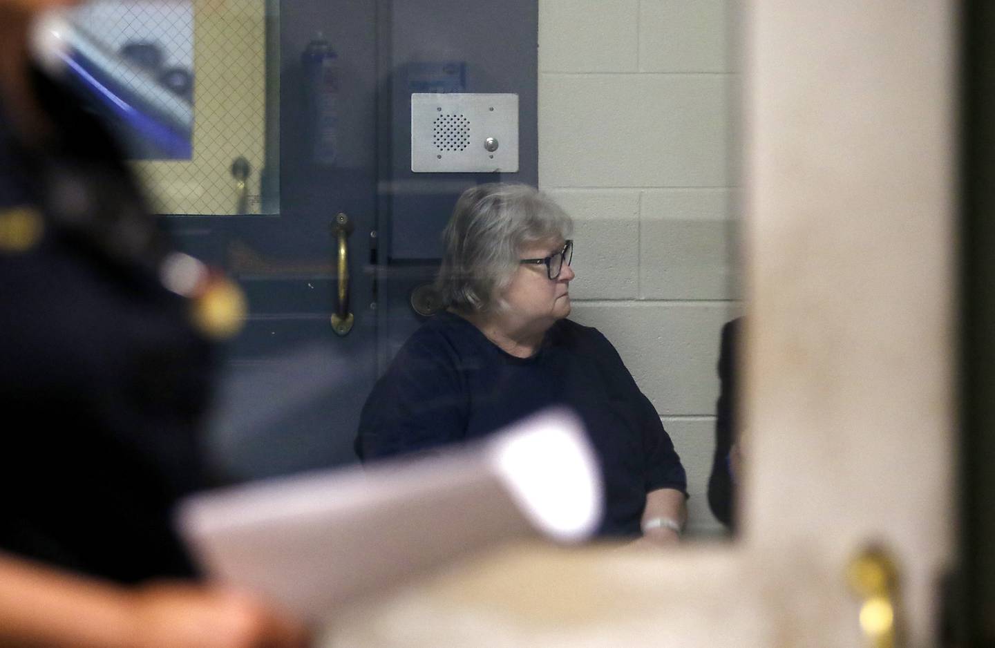 Roxanna L. Collins, 70, of McHenry, talks with defense attorney Jennifer Recktenwald on Tuesday, June 3, 2025, before Collins’ Initial appearance in Kenosha County Court. She was charged with first-degree intentional homicide in the 2003 death of her husband, David Vanderzee.