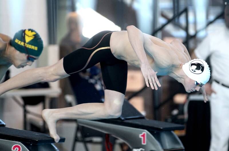 Plainfield’s Jack Burke takes off from the block for the championship heat of the 100-yard freestyle during the IHSA Boys Swimming and Diving Championships at FMC Natatorium in Westmont on Saturday, Feb. 26. 2022.