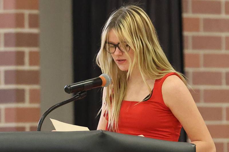 Parkside Middle School student Chloe Kreider, reads her poem "To Honor Those Who Served" during the Veterans Day program on Tuesday, Nov. 11, 2025 in Peru.