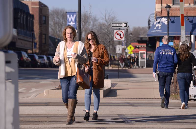 Nikki Cone' of Galva and her daughter Bri Plunkett of Naperville attend the Winter Wine and Cheese Walk in Wheaton Saturday, Feb 3, 2024.