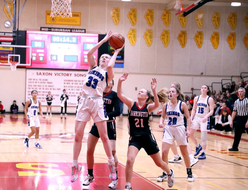 Geneva’s Lauren Slagle puts up a shot during the Class 4A Schaumburg Supersectional against Barrington on Monday, Feb. 27, 2023.