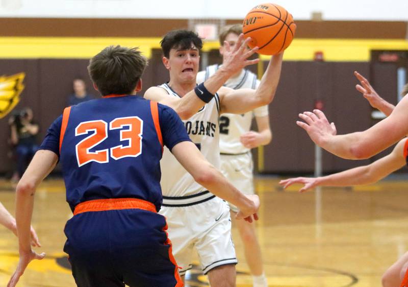 Cary-Grove’s Dylan Dumele moves the ball against Naperville North in varsity boys basketball Hinkle Holiday Classic action on Monday, Dec. 21, 2025, at Jacobs High School in Algonquin.