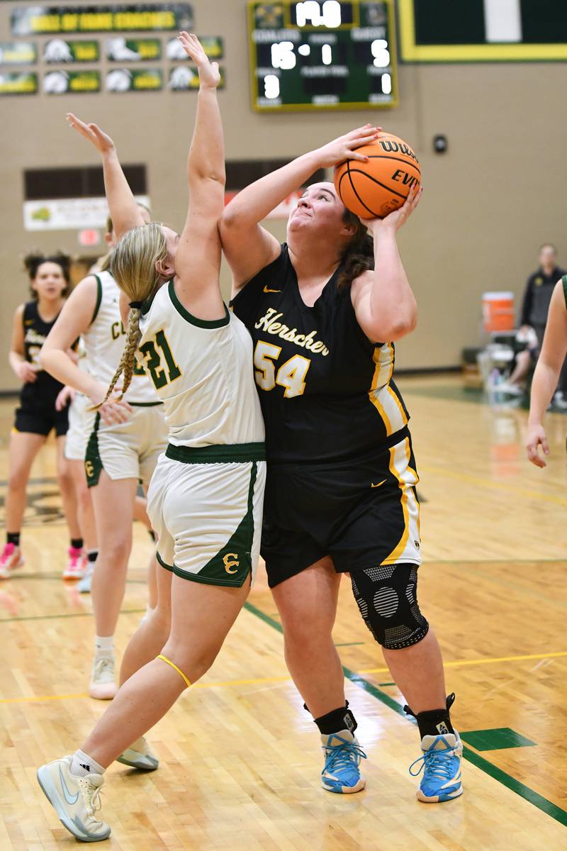 Herscher's Anistin Hackley goes for a layup against Coal City's D’Arcy Ness on Monday, Feb. 3, 2025, during the Coalers' victory over Herscher at Coal City High School.