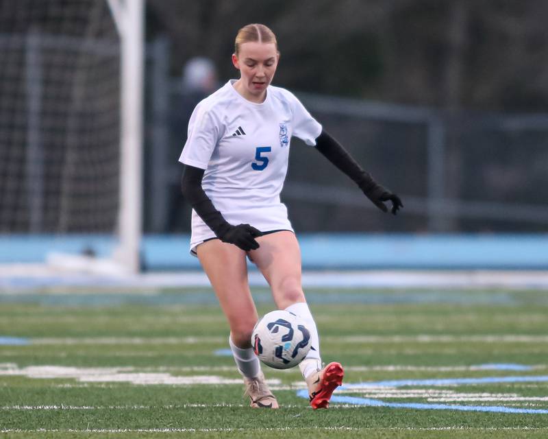 Riverside-Brookfield's Audrey Raymond (5) moves the ball down the pitch during soccer match between Riverside-Brookfield at Downers Grove South.  April 10, 2025.