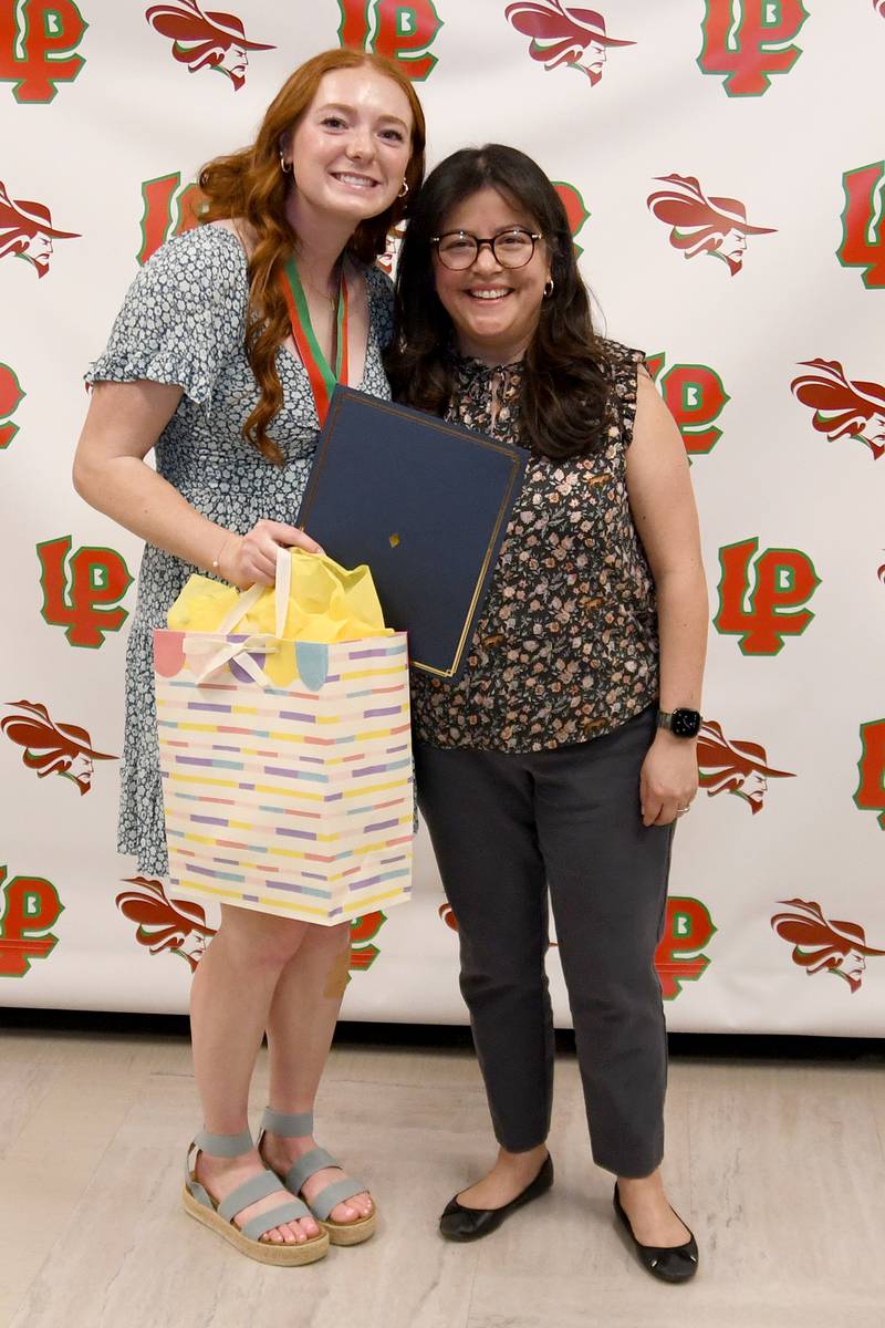 Addison Duttlinger (left) is the recipient of the 2024 Carol Walsh Memorial Spanish Award at La Salle-Peru High School.