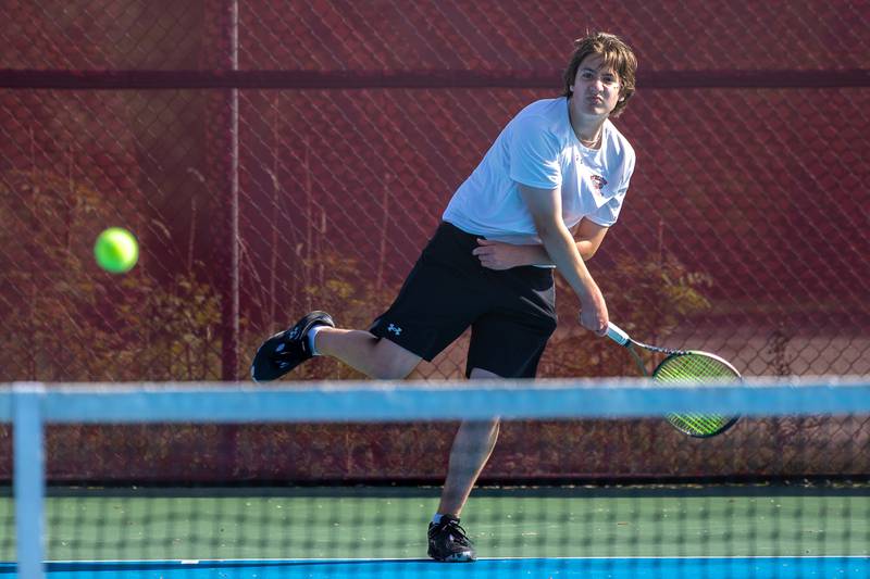 Streator No. 1 singles player Ryan Beck hits the ball Monday, May 5, 2025, in Streator.