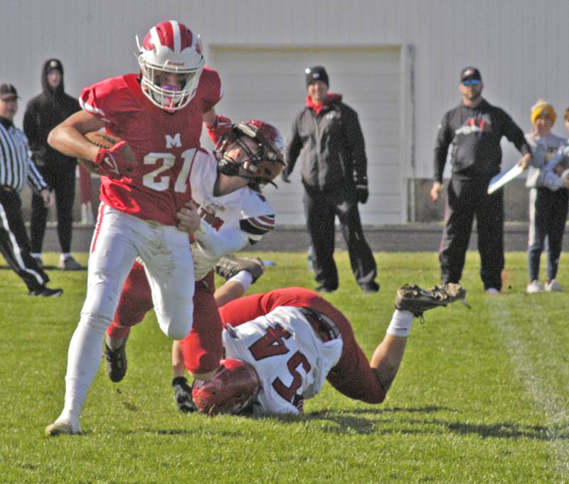 Morrison's Rylan Alvarado escapes Fulton tackles Saturday, Oct. 28, 2023 in round one of the Class 1A football playoffs.