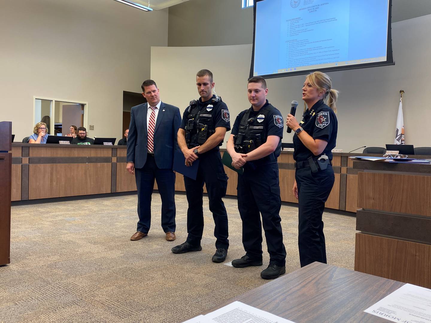 Officer Ryan Ties and Officer Nicholas Pampinella receive their Alliance Against Impaired Motorists awards on Monday night.