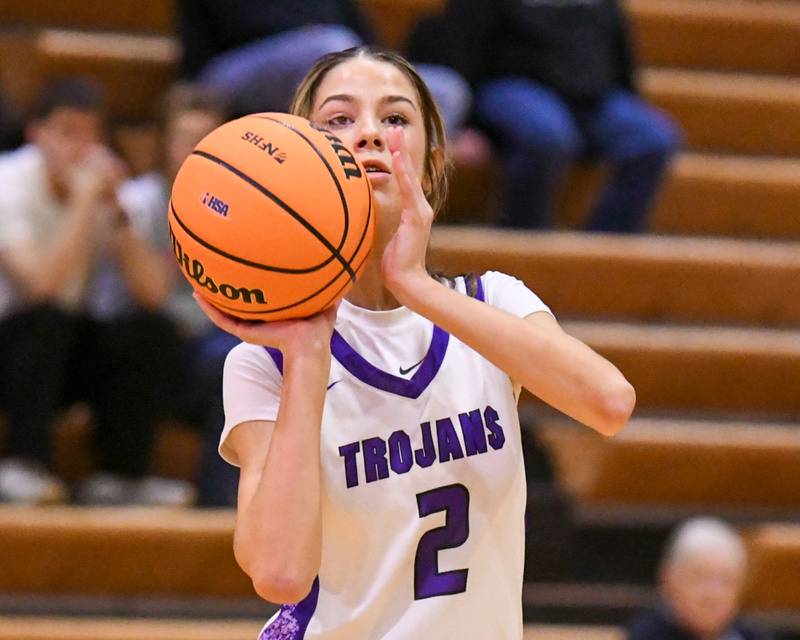 Downers Grove North's Eva Yerkovich (2) make a three-point basket during the 4A regional championship game while taking on St. Laurence on Thursday Feb. 19, 2026, held at Downers Grove North High School.