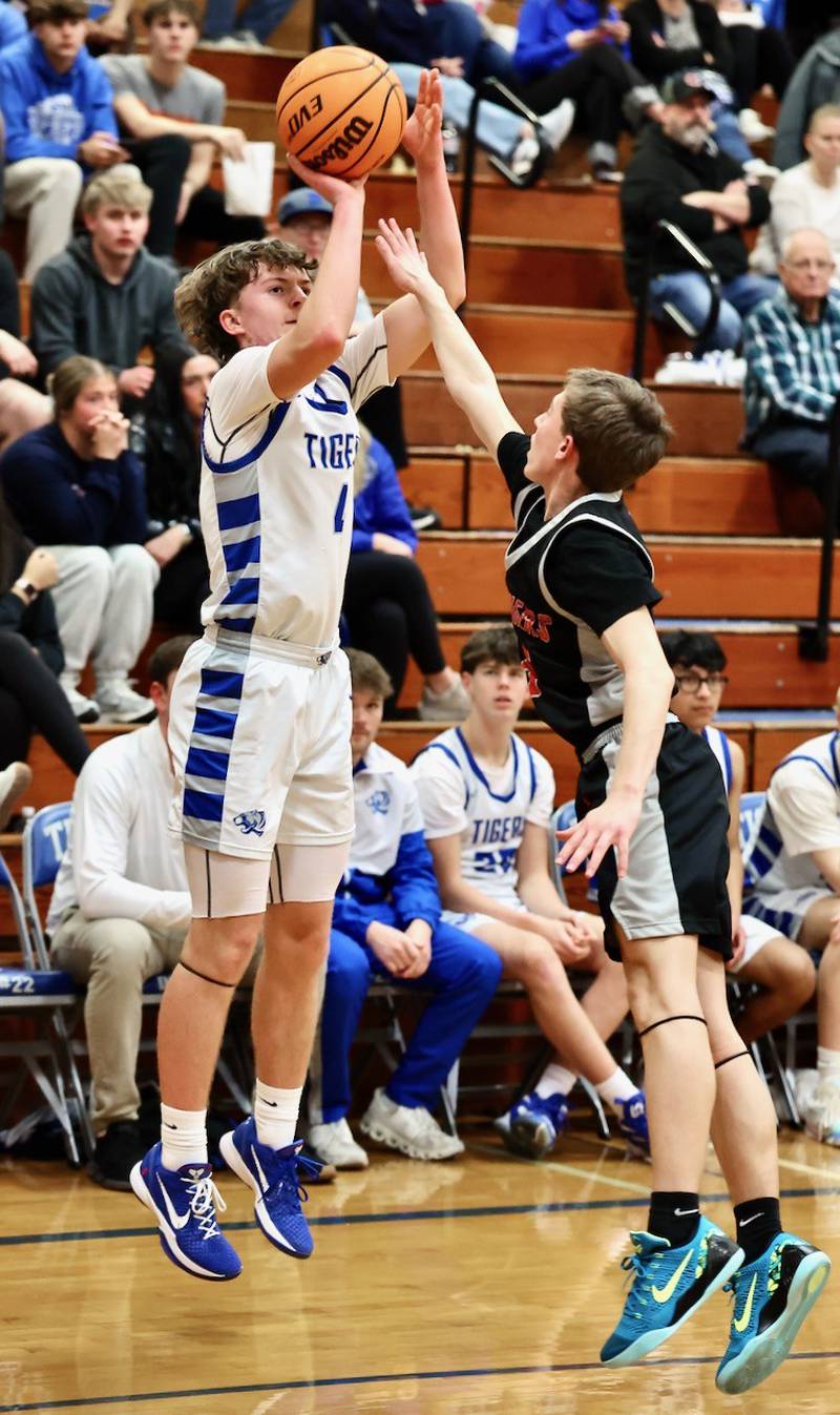 Princeton freshman Julia Mucha shoots a 3 from the corner against Erie-Prophetstown Tuesday night at Prouty Gym. The visiting Panthers won 54-46.