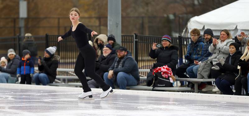 Emma Moreland, 13, of Carol Stream  and Center Ice DuPage performs during Ice-A-Palooza Saturday, Feb. 8, 2025 at the Central Athletic Complex in Wheaton.