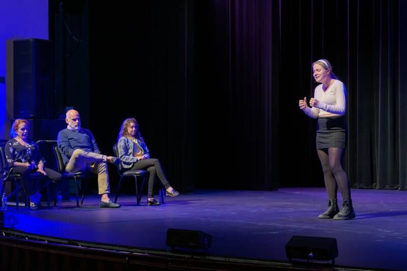 Students in the Raue Center for the Arts education program practice on stage.