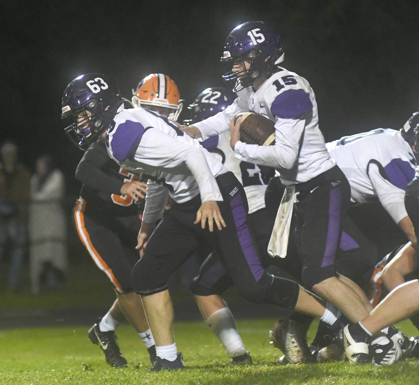 Dixon's Tyler Shaner follows a block from Peyton Dingley during Oct. 14 action against Byron.