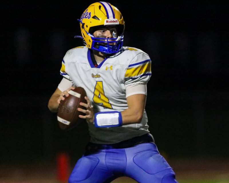 Sandburg's Anthony Shelton (4) looks downfield for an open receiver during football game between Sandburg at Lincoln Way Central.  Sept 22, 2023.