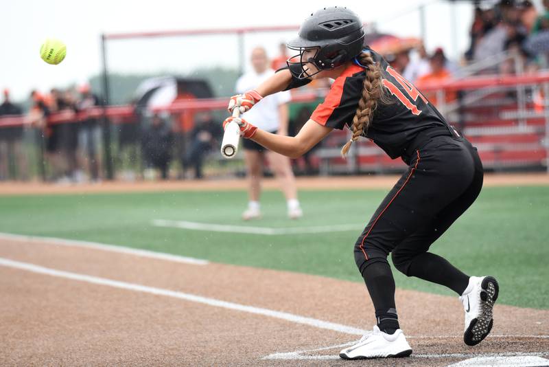Beecher's Liliana Irwin bunts the ball during the Class 2A State championship game against Carterville at the Louisville Slugger Complex in Peoria Saturday, June 7, 2025.